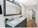 Modern bathroom with double vanity and marble countertop at 1007 Broadway St, Indianapolis, IN 46202