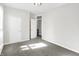 Bright bedroom with neutral walls and carpet floors at 1007 Broadway St, Indianapolis, IN 46202