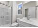 Bathroom with white vanity, shower, and toilet at 230 Mcnair Rd, Whiteland, IN 46184