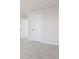 Simple bedroom with white door and carpet at 230 Mcnair Rd, Whiteland, IN 46184
