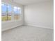 Bedroom with large window and grey carpet at 230 Mcnair Rd, Whiteland, IN 46184