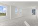 Spacious bedroom with grey carpet and multiple windows at 230 Mcnair Rd, Whiteland, IN 46184
