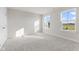 Bright bedroom with neutral walls and carpet at 230 Mcnair Rd, Whiteland, IN 46184