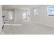 Bright loft bedroom with carpet and multiple windows at 230 Mcnair Rd, Whiteland, IN 46184