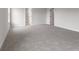 Spacious bedroom with grey carpet and access to other rooms at 250 Mcnair Rd, Whiteland, IN 46184