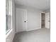 Bedroom with window, carpet, and neutral walls at 250 Mcnair Rd, Whiteland, IN 46184