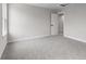 Bedroom with window, door to another room and grey carpet at 250 Mcnair Rd, Whiteland, IN 46184
