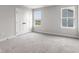 Bedroom with double door closet and two windows at 250 Mcnair Rd, Whiteland, IN 46184