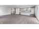 Open concept kitchen with white cabinets and an island at 250 Mcnair Rd, Whiteland, IN 46184
