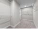 Bright walk-in closet with wire shelving, offering ample storage at 250 Mcnair Rd, Whiteland, IN 46184