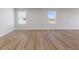 Spacious bedroom with neutral carpeting and large window at 408 Charles Freer Ln, Whiteland, IN 46184