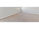 Simple bedroom with neutral carpeting and a window at 408 Charles Freer Ln, Whiteland, IN 46184