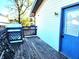 Wooden deck with blue door and bicycle at 290 W Washington St, Martinsville, IN 46151