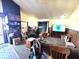 Bright living area with a large TV, comfortable seating, and an open floor plan at 290 W Washington St, Martinsville, IN 46151
