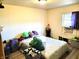 Bright bedroom with a double bed and window at 290 W Washington St, Martinsville, IN 46151