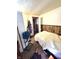 Simple bedroom with double bed, dresser and closet at 290 W Washington St, Martinsville, IN 46151