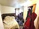 Cozy bedroom with a double bed, dresser and closet space at 290 W Washington St, Martinsville, IN 46151