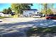 Gravel parking area with view of home and lot at 290 W Washington St, Martinsville, IN 46151