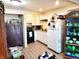 Efficient kitchen with white cabinets and appliances at 290 W Washington St, Martinsville, IN 46151
