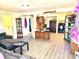 Living room with kitchen view and wood floors at 290 W Washington St, Martinsville, IN 46151