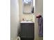 Small bathroom with vanity and mirror at 290 W Washington St, Martinsville, IN 46151