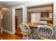 Dark wood cabinets, butcher block counters, and stainless steel appliances at 7060 S Meridian St, Indianapolis, IN 46217