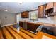 Dark wood cabinets, butcher block countertops, and stainless steel appliances at 7060 S Meridian St, Indianapolis, IN 46217