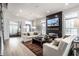 Open living space with hardwood floors and a cozy seating area at 456 Monon Way Dr, Carmel, IN 46032