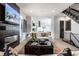 Open concept living room with a view into the kitchen and dining area at 456 Monon Way Dr, Carmel, IN 46032