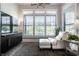 Cozy sitting area with a comfortable chair, ottoman and large window at 456 Monon Way Dr, Carmel, IN 46032