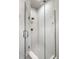 Modern shower with white herringbone tile and glass enclosure at 456 Monon Way Dr, Carmel, IN 46032