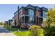 Brick front exterior with gray accents and a porch at 456 Monon Way Dr, Carmel, IN 46032