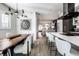 Kitchen dining area with modern chandelier and large wooden table at 456 Monon Way Dr, Carmel, IN 46032