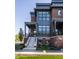 Brick front exterior with gray accents and a porch at 456 Monon Way Dr, Carmel, IN 46032