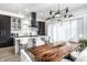 Open concept kitchen and dining area with modern finishes and ample seating at 456 Monon Way Dr, Carmel, IN 46032