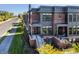 Brick front exterior with gray accents and a porch at 456 Monon Way Dr, Carmel, IN 46032
