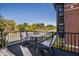 Private deck with seating area, overlooking a tree-lined street at 456 Monon Way Dr, Carmel, IN 46032