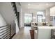 Spacious living room with light colored sofas and a view of a sitting area at 456 Monon Way Dr, Carmel, IN 46032