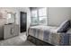 Bright bedroom with a trundle bed and plenty of natural light at 456 Monon Way Dr, Carmel, IN 46032