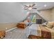 Serene bedroom with king-size bed and a twin-size bed at 512 S Cherry St, Westfield, IN 46074