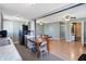 Kitchen with gray cabinets, a dining area, and view of living room at 1120 Lexington Ave, Indianapolis, IN 46203