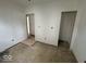 Unfinished bedroom with new drywall and flooring to be installed at 3221 E 38Th St, Indianapolis, IN 46218