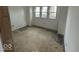Simple bedroom with new drywall and flooring to be installed at 3221 E 38Th St, Indianapolis, IN 46218