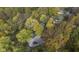 Autumn aerial view of house nestled in the woods at 9562 N Gasburg Rd, Mooresville, IN 46158
