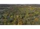 Wide aerial view of property and surrounding forest at 9562 N Gasburg Rd, Mooresville, IN 46158