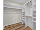 Large walk-in closet with shelves and hanging rods at 9562 N Gasburg Rd, Mooresville, IN 46158