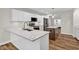 Modern kitchen with white cabinets and quartz countertops at 9562 N Gasburg Rd, Mooresville, IN 46158
