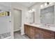 Double vanity bathroom with a large mirror and a walk in shower at 9562 N Gasburg Rd, Mooresville, IN 46158