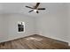 Bedroom with window and ceiling fan at 9562 N Gasburg Rd, Mooresville, IN 46158