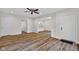 Spacious living room with hardwood floors and ceiling fan at 9562 N Gasburg Rd, Mooresville, IN 46158